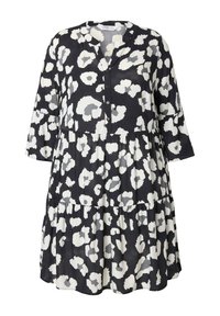 Schwarz-weißes, gestuftes Kleid mit einem Leopardenmuster, 3/4-Ärmel, knöpfbarer Front und leichtem, fließendem Stoff.