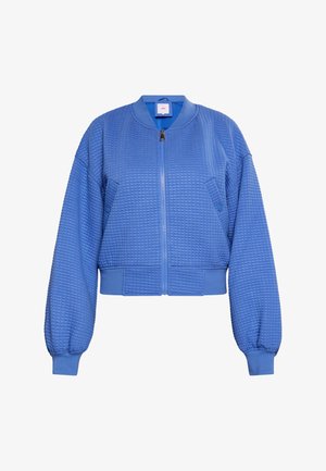 Giacca bomber blu cropped realizzata in tessuto strutturato con chiusura a zip frontale, polsini a coste e tasche laterali. Presenta un colletto arrotondato.