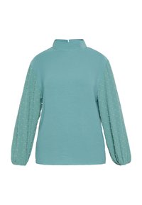 Bluză teal cu guler înalt și un corp texturat. Mânecele lungi au un model cu puncte pentru un detaliu suplimentar, cu manșete gathered.