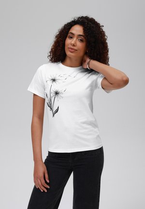 Hvid T-shirt med et sort design af mælkebøtte og blad. Korte ærmer og klassisk snit. Glat bomuldsstof.