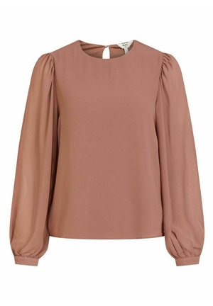 Blusa de manga larga color malva con mangas abullonadas, escote redondo, cierre con botones en la parte trasera y puños fruncidos.