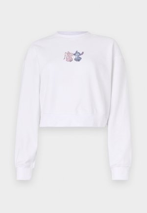 White cropped sweatshirt with long sleeves. Features embroidered cartoon characters in pink and blue on the chest. Soft cotton material.
