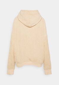 Beige Cord-Hoodie mit strukturierter Oberfläche, ausgestattet mit einer gemütlichen Kapuze und gerippten Bündchen. Das Design ist lässig und leicht tailliert.