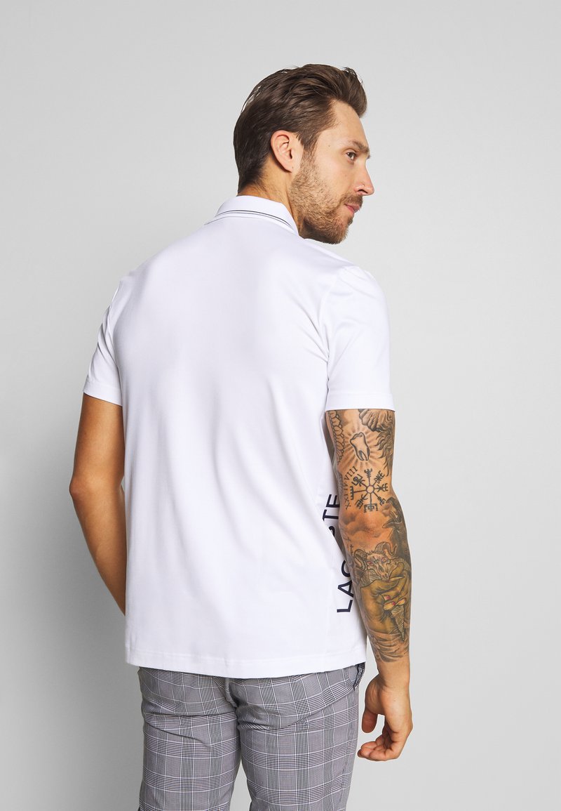 Herren Shirts | Lacoste Sport BASIC GOLF Sport T-shirt white/navy blue/weiß - TB96968 Herren Shirts | Lacoste Sport BASIC GOLF Sport T-shirt white/navy blue/weiß - TB96968