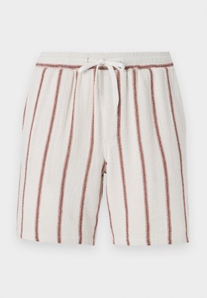 Cotton shorts featuring a drawstring waist, cream background with vertical rust-colored stripes, textured fabric, and relaxed fit.