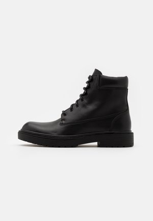 Schnürstiefelette - black