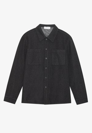 Dark gray shirt made of textured fabric, featuring a pointed collar, button front, and two chest pockets. Long sleeves with buttoned cuffs.