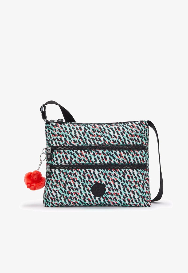 Crossbody bag with a patterned fabric in aqua, red, and black. Features two zippered pockets and a red furry monkey charm.
