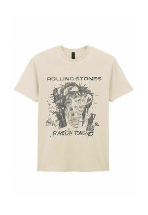 Camiseta beige con gráfico negro de un rostro distorsionado, texto "ROLLING STONES" arriba y "FOREIGN TONGUES" debajo de la imagen.