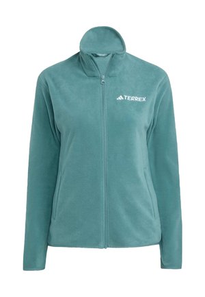 Giacca in pile di un leggero teal con colletto alto, zip frontale completo e tasche laterali. Presenta il logo bianco "TERREX" sul lato sinistro del petto. Texture morbida.