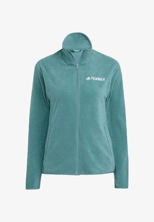 Giacca in pile di un leggero teal con colletto alto, zip frontale completo e tasche laterali. Presenta il logo bianco "TERREX" sul lato sinistro del petto. Texture morbida.