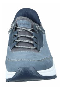 Rieker sneaker in blue and gray leather. Features rounded toe, lace-up front, contrasting stitching, and a white rubber sole.
