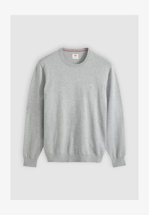 Jersey de cuello redondo gris claro con mangas largas, puños y dobladillo acanalados, y un pequeño logo en el pecho izquierdo.