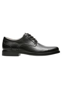 Schwarze Lederdressschuhe mit einer glatten Oberfläche, runder Zehenpartie und einem Fünf-Loch-Schnürdesign. Verfügt über eine strukturierte Sohle für Grip und Stabilität.