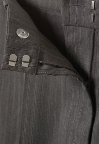 Dark gray pinstripe pants with zipper, button closure, and two metal hook clasps on waistband.