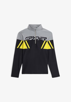 Schwarzer Pullover mit langen Ärmeln und halbem Reißverschluss, oberer Bereich in Grau, mit gelben dreieckigen Designs und "SPYDER"-Logo auf der Brust.