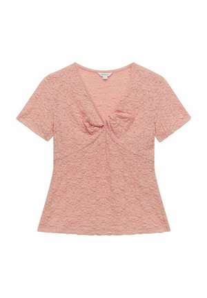 Haut rose clair à manches courtes avec un motif floral texturé, décolleté en V, et un détail de nœud froncé au centre devant. Coupe régulière.