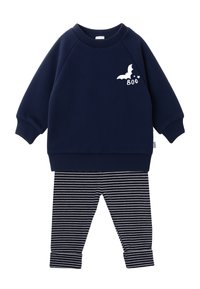 Navy sweatshirt with white bat and "BOO" print, paired with striped leggings in navy and white. Soft fabric, ribbed cuffs, and waistband.