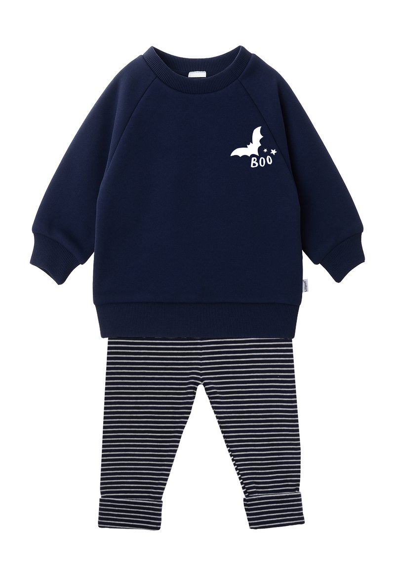 Navy sweatshirt with white bat and "BOO" print, paired with striped leggings in navy and white. Soft fabric, ribbed cuffs, and waistband.