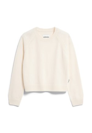 Pull cropped crème léger en tissu doux. Il présente des poignets et un ourlet côtelés, une étiquette sur la couture latérale gauche et des manches raglan.
