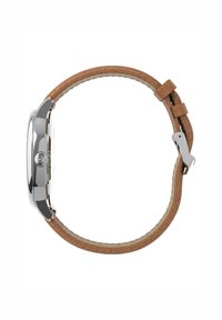 Vista laterale di un orologio da polso con cassa in argento lucido e cinturino in pelle marrone con cuciture e fibbia argentata.