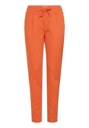 Pantalon de jogging orange avec taille à cordon, deux poches avant et jambes fuselées, fabriqué en tissu doux et extensible pour le confort.