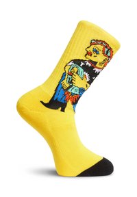 Chaussette de travail jaune avec un graphique coloré d'un personnage tenant un objet bleu, avec un orteil et un talon noirs ; texture lisse et tricotée.