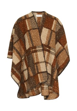 Poncho en laine à carreaux marron, crème et rouille avec un devant ouvert et des bords cousus en noir, étiqueté "CRÈME" à l'intérieur du col.