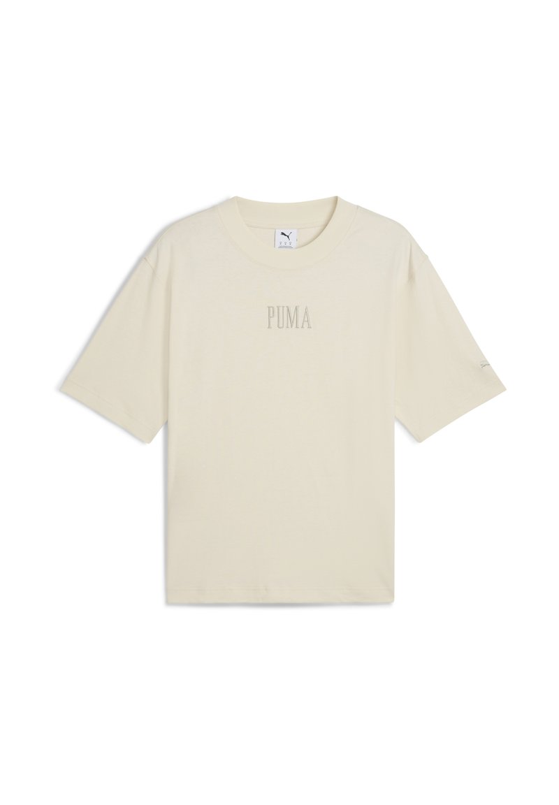Béžové tričko s krátkým rukávem vyrobené z bavlny. Má kulatý výstřih a decentní logo "PUMA" uprostřed. Volný střih.