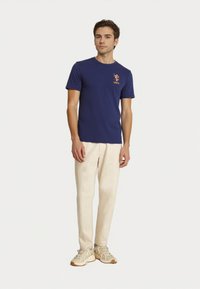 U.S. Polo Assn. KURZARM REITER - Nyomott mintás póló - dunkelblau