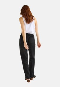 Monoprix À TAILLE SEMI-ÉLASTIQUÉE  - Pantalon classique - noir