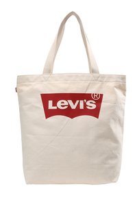 Torba płócienna w jasnym beżu z podwójnymi uchwytami z tkaniny. Z przodu znajduje się wyraźne logo Levi's w kolorze czerwonym, minimalistyczny design, bez wzorów.