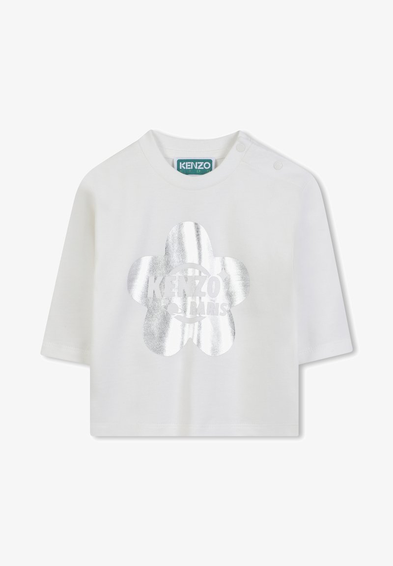 Witte katoenen t-shirt met korte mouwen, voorzien van een zilver metallic bloemenontwerp met de tekst "KENZO PARIS" in het midden. Drukknoopsluiting op de schouder.