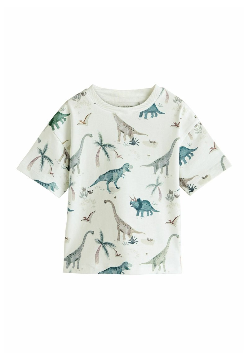 Kurzärmliges T-Shirt in Off-White mit einem mehrfarbigen Muster aus Dinosauriern und Palmen. Hergestellt aus weichem Stoff mit rundem Ausschnitt.