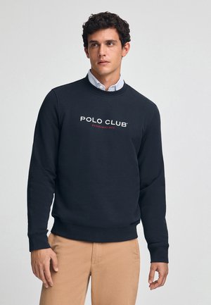 Marine sweatshirt van een katoenmix, met een ronde hals, geribde manchetten en het logo "POLO CLUB OPGERICHT 2012" in wit en rood.