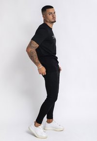 The Jokers SPIRAL  - Camiseta estampada - black