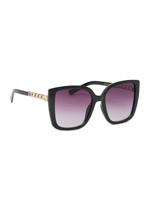 Gafas de sol cuadradas negras sobredimensionadas con lentes morados degradados y detalle de cadena dorada en las patillas, sobre un fondo blanco.