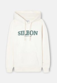Felpa con cappuccio color crema, con tasca frontale, coulisse e la scritta "SILBON NATURE NOMAD" stampata in verde e nero sul petto.