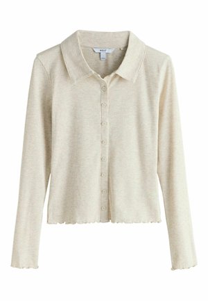 Beige ribbed long-sleeve cardigan with a collared neckline, scalloped hem, and button-down front. Soft texture and lightweight fabric.