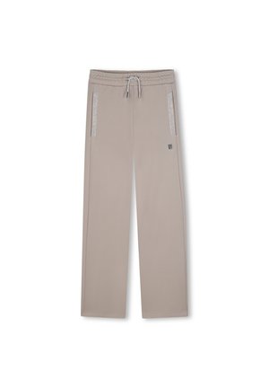 Pantalon de jogging beige à jambe droite avec taille élastique, cordon, poches latérales avec liseré réfléchissant et petit logo sur la cuisse gauche.
