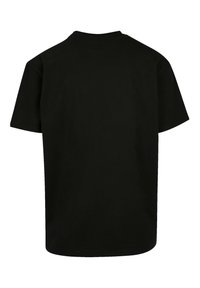 Black short-sleeve t-shirt made of cotton. Relaxed fit with a round neckline. Smooth texture and no visible patterns or accents.