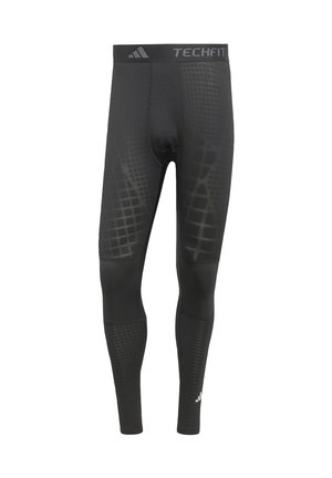 Leggings atletici Black TechFit realizzati in materiale elasticizzato. Presentano un motivo a griglia testurizzato e una cintura con logo di marca.