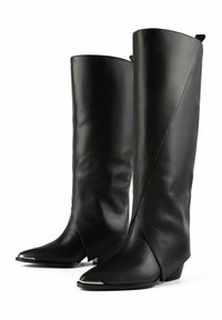Black leather knee-high boots with a pointed toe and angled design, featuring a silver accent on the toe and a textured finish.