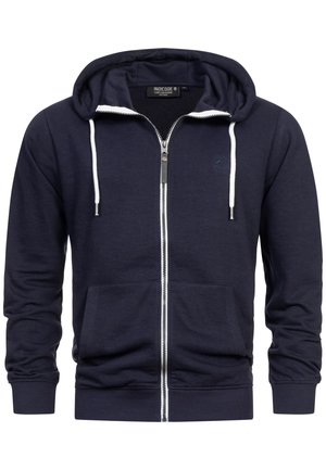 Navy zip-up hoodie with white drawstrings, kangaroo pocket, and ribbed cuffs. Soft fabric with a logo detail on the chest.