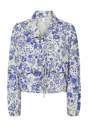 Blusa accorciata in tessuto leggero con motivo floreale blu su sfondo bianco. Presenta un colletto, dettagli arricciati e una chiusura con fiocco.