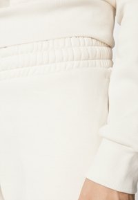 Puma ANIMAL PANTS - Pantalones deportivos - alpine snow