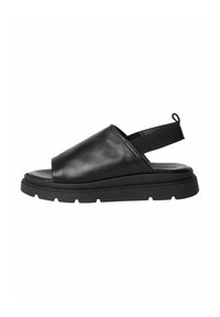 Sandali neri in pelle con una larga fascia frontale, fascetta elastica sul retro e suola nera spessa e texturizzata. Design minimalista con sottopiede imbottito.