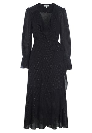 Vestido negro hecho de tela ligera, con diseño cruzado, escote con volantes, mangas largas abullonadas y patrón de lunares, con cintura anudada.