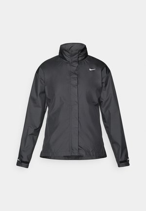 Giacca a vento nera con colletto alto, chiusura full zip e logo Nike sul petto; realizzata in tessuto leggero e liscio.