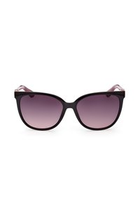 Lunettes de soleil noires en forme d'œil de chat avec des verres dégradés violets. Monture à finition brillante, décorée de subtils accents métalliques sur les branches.